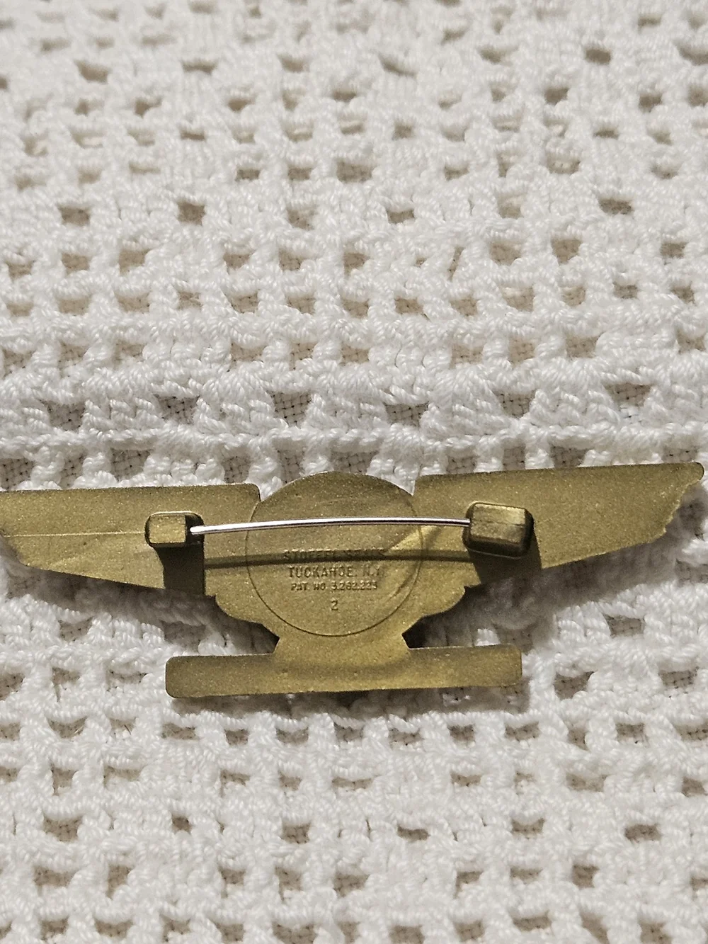 vintage 1970s Frontier Airlines Junior Pilot lapel pin.